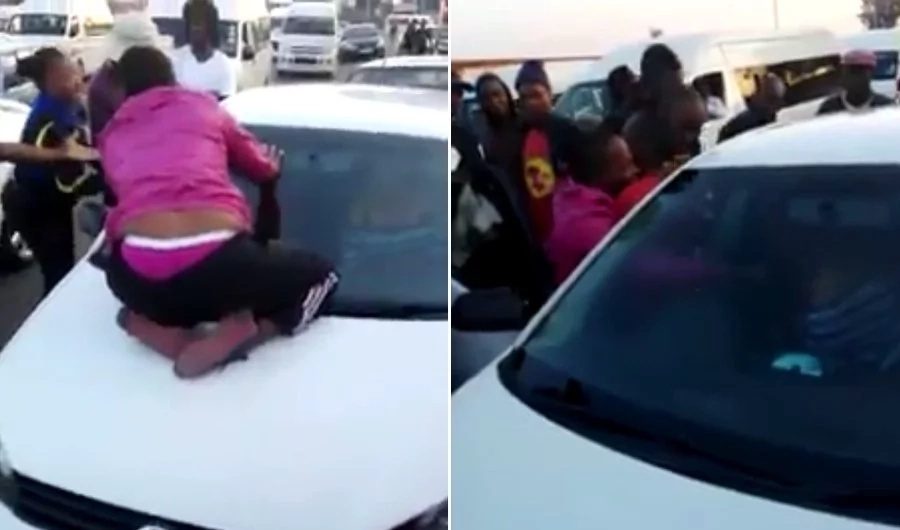 Man was caught cheating. Wife clings to husband's car windscreen as he escapes with 'side chick' Man was caught cheating. Wife clings to husband's car windscreen as he escapes with 'side chick'