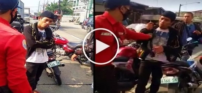 Netizens slam alleged motorcycle thief for acting arrogantly toward traffic enforcers in Valenzuela City