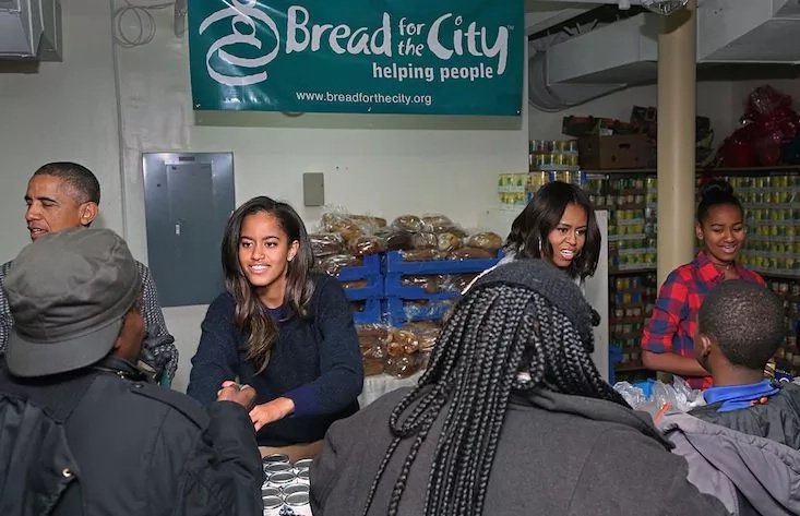 Malia and her family humbly serving guests