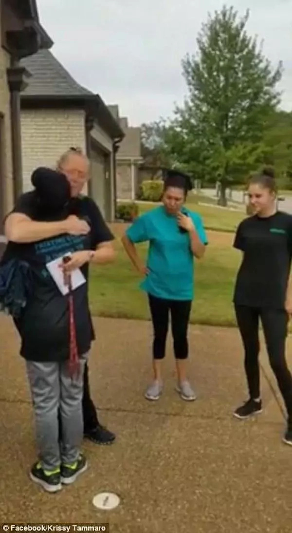 The emotional moment her colleagues presented her with the car. Facebook/Krissy Tammaro The emotional moment her colleagues presented her with the car. Facebook/Krissy Tammaro