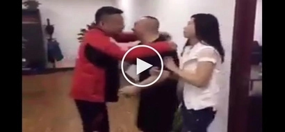 Harap-harapang iniiputan sa ulo! Man caught kissing friend's wife in viral clip