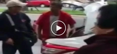 Sobrang gahaman! Greedy Pinoy taxi driver throws out old couple’s baggage for refusing to pay extra fee