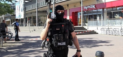 German theater attacker shot dead; 25 people injured