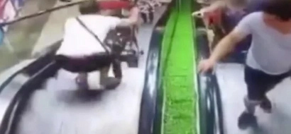 WATCH: Baby crashes down escalator, what his mother did will make you mad!
