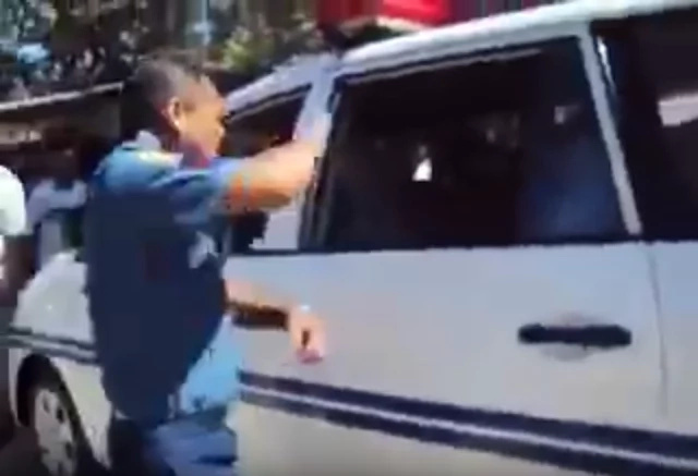 Police harasses arrested man Police harasses arrested man