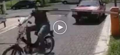 Nagmamadali kasi! Reckless Pinoy biker’s neck brutally injured by automatic boom gate in subdivision
