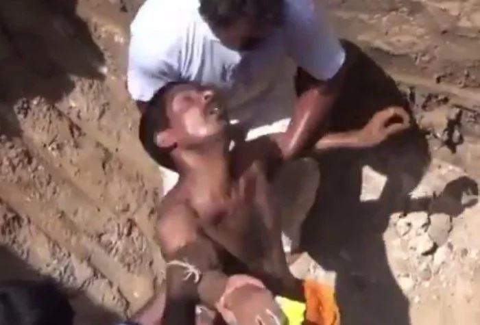 Man starts digging up in the middle of highway. He does it because 'Lord has told him to'. His villagers believe him and join! Man starts digging up in the middle of highway. He does it because 'Lord has told him to'. His villagers believe him and join!