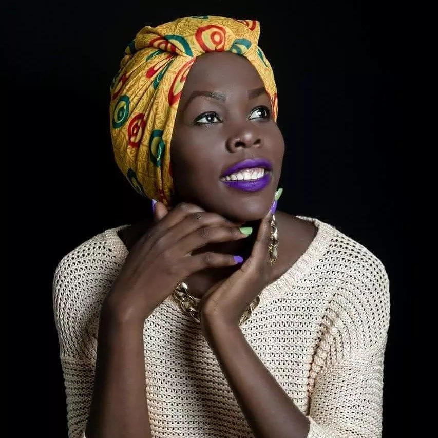 Watch how this lady uses head wraps with beautiful results - and good business Watch how this lady uses head wraps with beautiful results - and good business