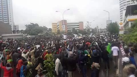 Hundreds brave the rain in a CORD march to the IEBC offices