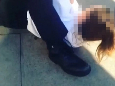 Police officer is caught on camera 'dragging 13-year-old girl by her hair