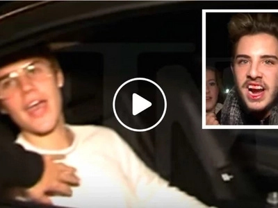Justin Bieber Punches Bieber Fan For Sticking Head Into Biebermobile