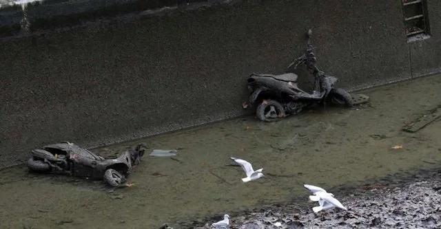 When this old canal was drained, locals were surprised to find a lot of unexpected things on the bottom. When this old canal was drained, locals were surprised to find a lot of unexpected things on the bottom.