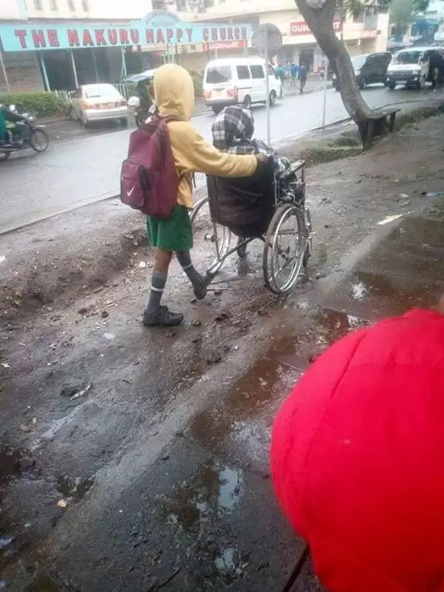 Meet the lovely Kenyan kid who wheels his disabled mom to work before going to school Meet the lovely Kenyan kid who wheels his disabled mom to work before going to school