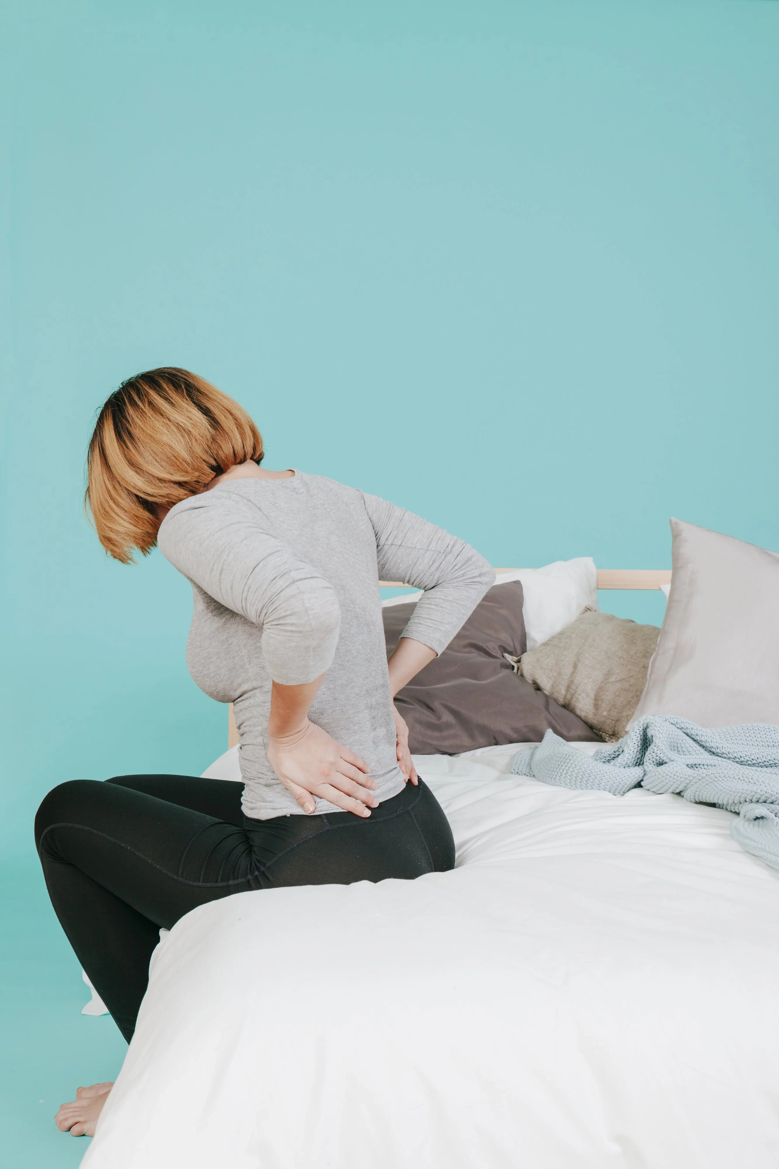 Top causes of back and abdominal pain for women