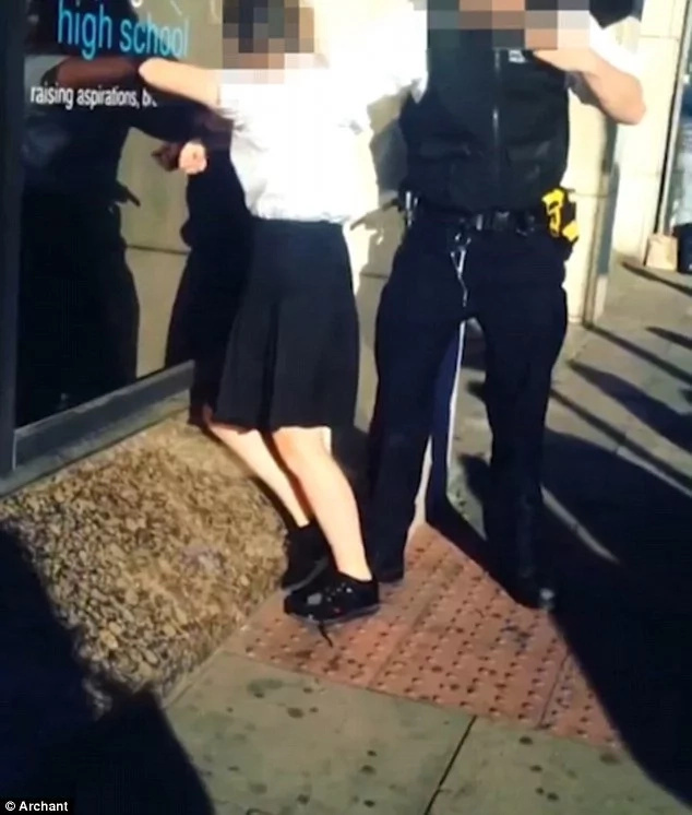 Police officer is caught on camera dragging 13-year-old girl by her hair Police officer is caught on camera dragging 13-year-old girl by her hair