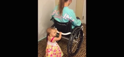 Disabled mom uses her wheelchair to teach her baby how to walk