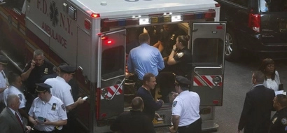 A psycho was shot by the police after he chopped an officer in the head with a cleaver