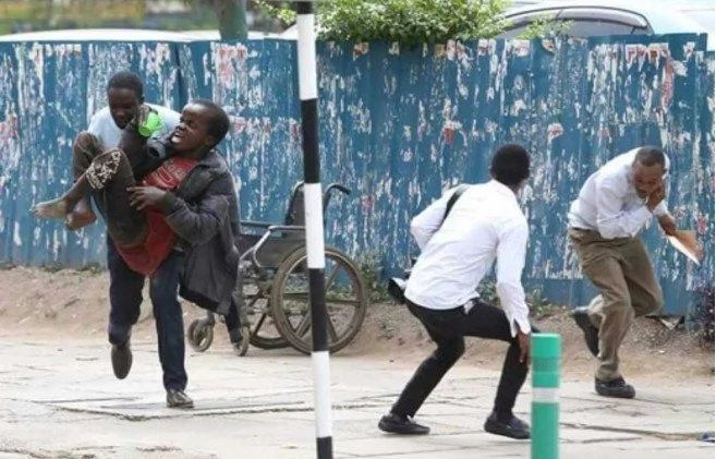 Journalist wins Kenyans' hearts by saving disabled man from swarm of bees