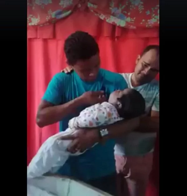 This father takes out his son from coffin and doesn't want to put him back This father takes out his son from coffin and doesn't want to put him back
