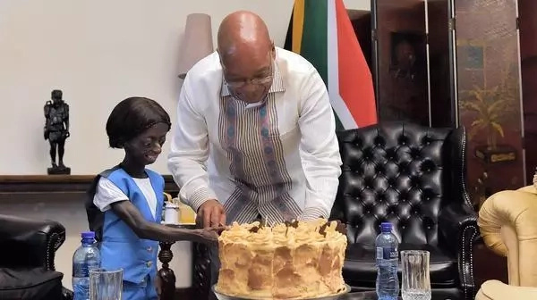 Girl trapped in body of aging pensioner celebrates 18th birthday with President (photos, video)