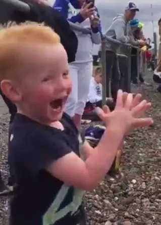 This kid's reaction to a motorcycle is adorable This kid's reaction to a motorcycle is adorable