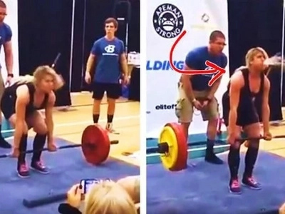 Female weightlifter tried to deadlift in front of judges & audience. She felt extremely sick & threw up while lifting the heavy barbell!
