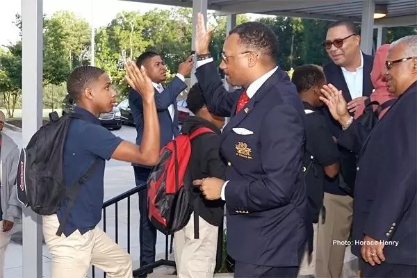 Encouraging! Black empowerment group gives students returning to school a warm welcome Encouraging! Black empowerment group gives students returning to school a warm welcome