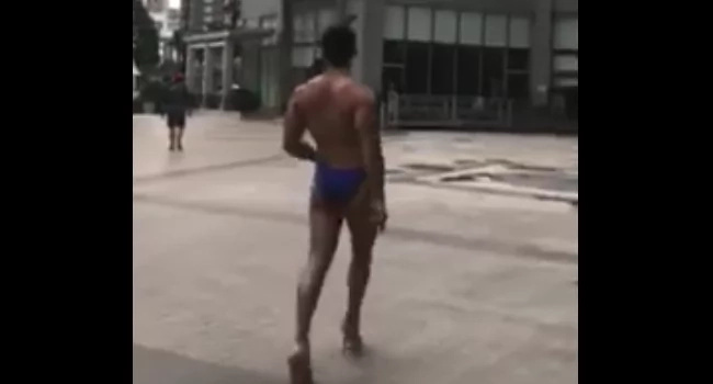 He walks on high heels like a lady! He walks on high heels like a lady!
