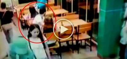 Sneaky Pinoy thieves steal smartphone from unsuspecting customer at fast food restaurant