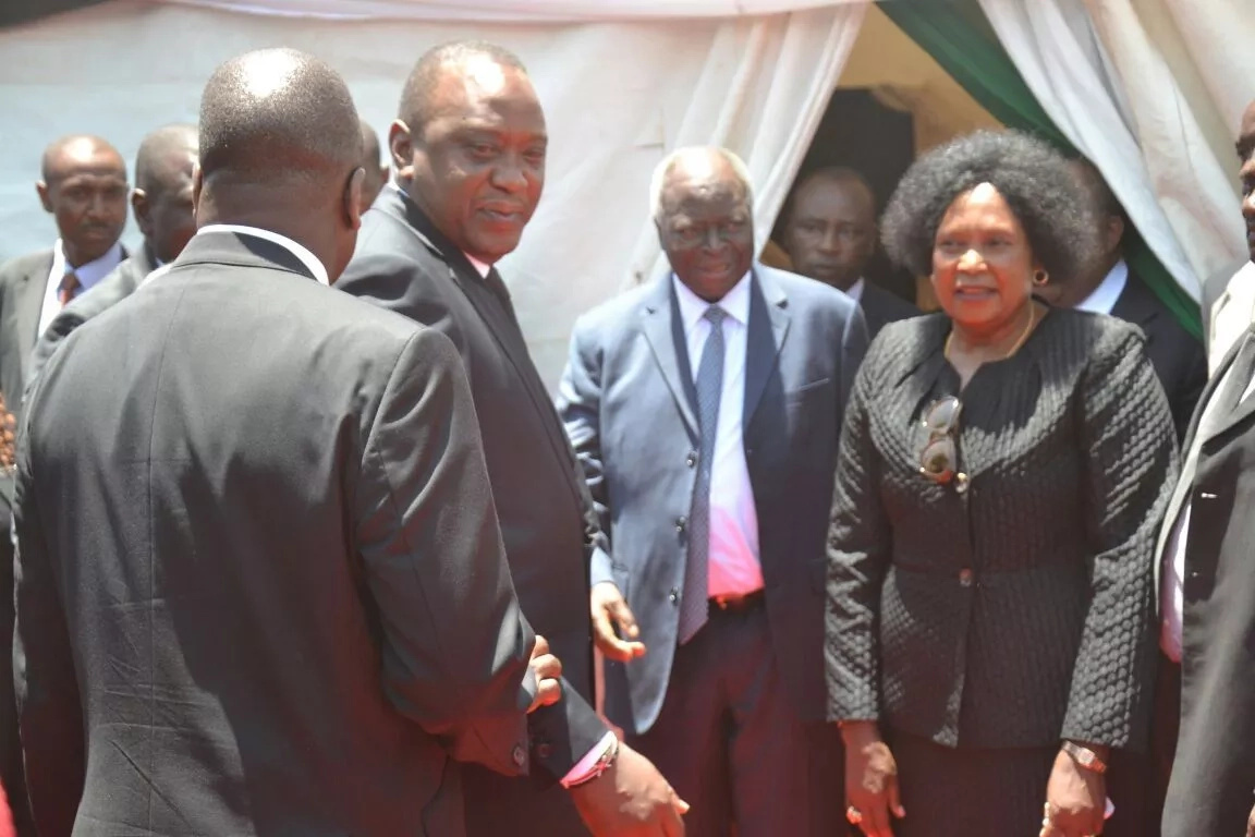 Kibaki's female companion at Nderitu Gachagua's raises eyebrows