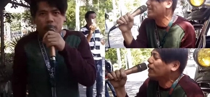 Call center agent grabs microphone and sings in public. It was just like his own concert