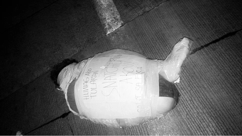 Body of an alleged snatcher found in EDSA Body of an alleged snatcher found in EDSA
