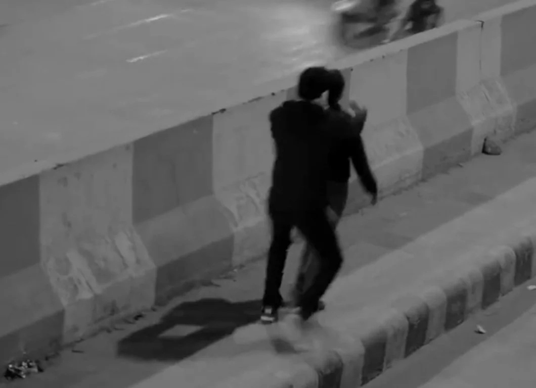 A guy sneaked up and grabbed the victim from behind A guy sneaked up and grabbed the victim from behind