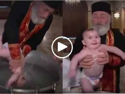 Ang tinding binyag naman nito! Video of babies being baptized in Georgia will make your head spin