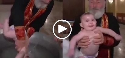 Ang tinding binyag naman nito! Video of babies being baptized in Georgia will make your head spin
