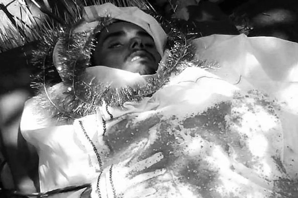 Dead man bitten by a snake comes back to life in his funeral Dead man bitten by a snake comes back to life in his funeral