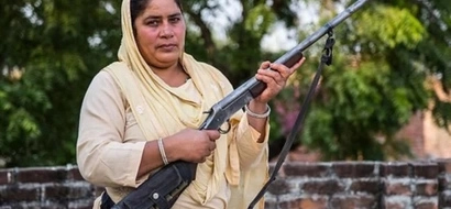 Armed and ready: Indian woman takes to the streets the gun to get justice for rape victims