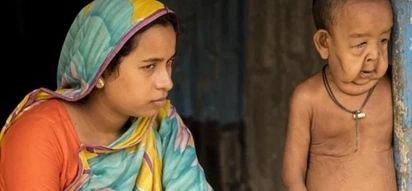 This boy is only four years old, but looks as old as a grandfather