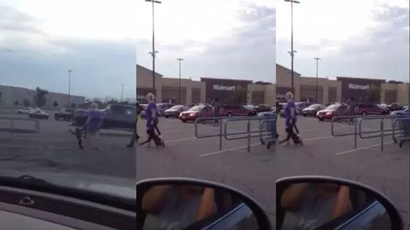 Watch a monkey go wild on Walmart parking lot Watch a monkey go wild on Walmart parking lot