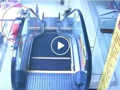 Frightening video of 2-year old falling from escalator in Chinese mall