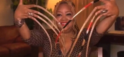 Her fingernails are over 26 inches long - Here is why she did it