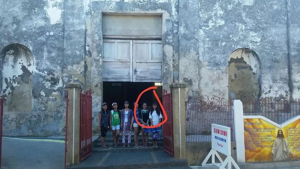 Unknown priest photobombed their group photo which gave everyone in the goosebumps. Check out the story behind this! Unknown priest photobombed their group photo which gave everyone in the goosebumps. Check out the story behind this!