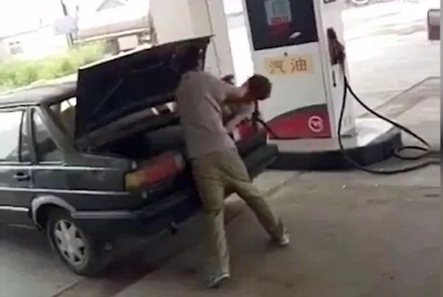 SAD Video: Man beats his wife then locks her in the boot of his car