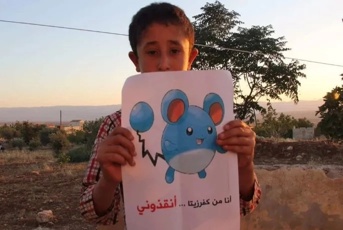 Syrian children plead for help through posting Pokemon photos Syrian children plead for help through posting Pokemon photos