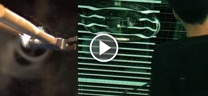 Slow-motion 120 000 fps video of hammer smashing a mirror reveals something truly amazing