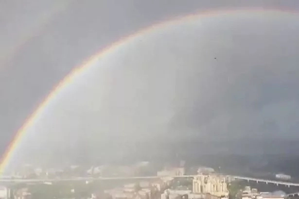 Aerial photos from a crane operator in Russia shows a really close view of a rainbow Aerial photos from a crane operator in Russia shows a really close view of a rainbow