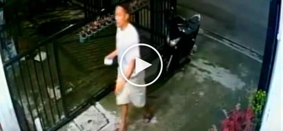 Dangerous Pinoy hold-upper robs scared customers in Quezon City laundry shop