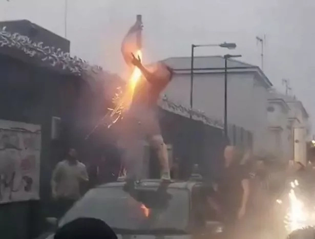 Daredevil! Wrestler wows cheering onlookers by setting himself on FIRE (photos, video)