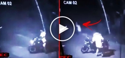 This motorcycle rider encountered a ‘White Lady’ on the side of the road. Watch the terrifying CCTV footage here!