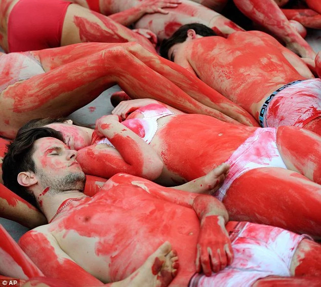 Animal Lover Stage Bloody Protest Against Meat Consumption